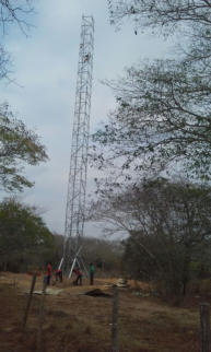 Rural Concreteless Lattice Tower - Antenna being mounted